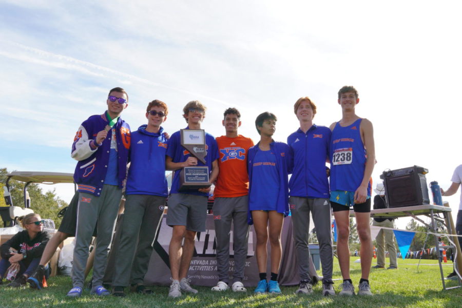 Bishop Gorman mens cross country with the trophy.