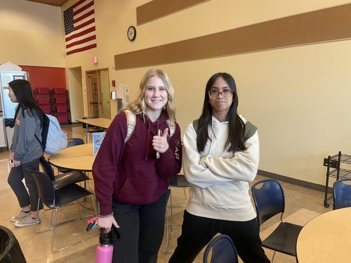 Olivia Calloway ‘26 and Danica Serra ‘26 after school in the commons on comfy day. 