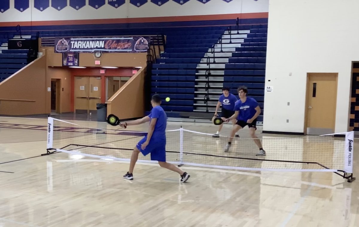 Physical Education student Kaina Watson ‘26 returning a backhand shot against his opponent on March 22, 2024 in the Bishop Gorman gymnasium. 