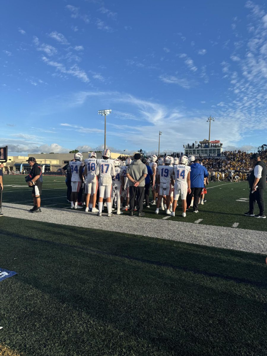 Bishop Gorman huddle in the first half