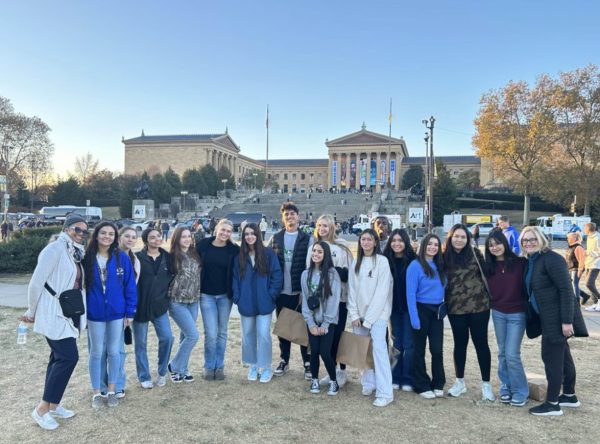 The Lance Staff after seeing the Rocky Balboa statue on the last day of their trip. 