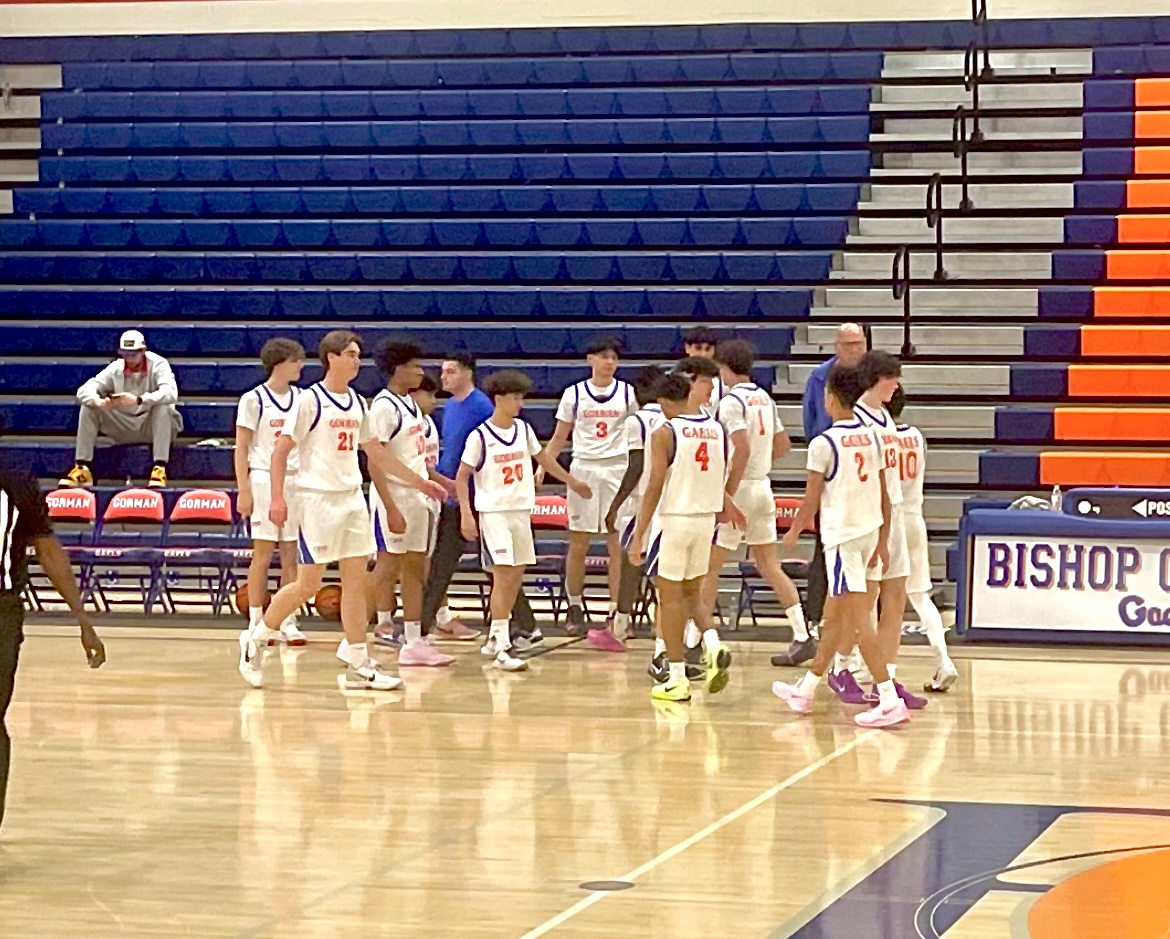 Bishop Gorman JV team walking to the bench after the quarter ends. 