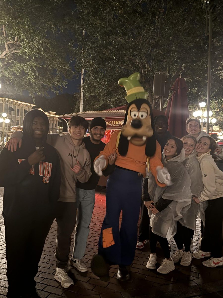 ASG taking a picture with Goofy 