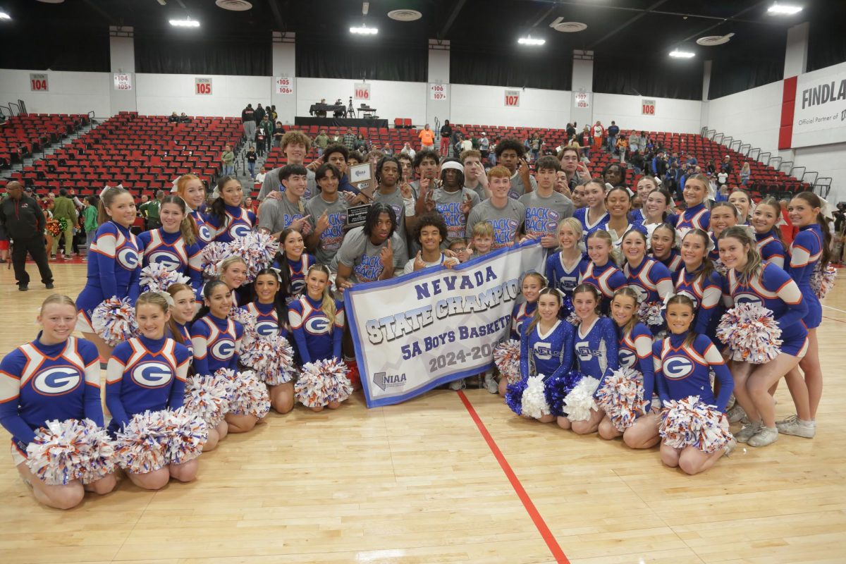 The Bishop Gorman men's varsity basketball team celebrating after winning the 5A Nevada State Championship game.