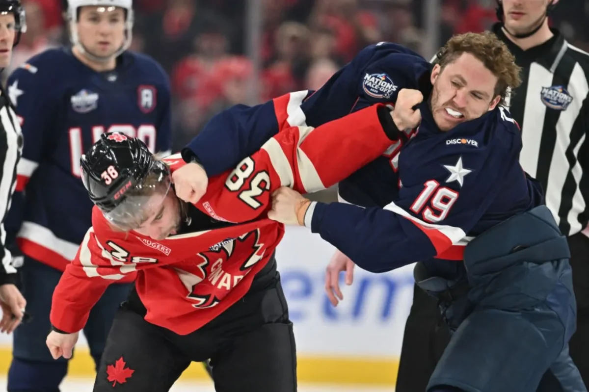 Matthew Tkachuk (right) and Brandon Hagel (left) in a fight nine seconds into the USA and Canada 4 Nations Face-Off game.