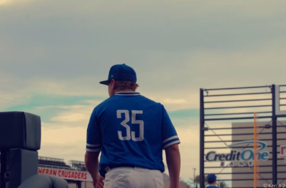 Ryan Hunter ‘25 walking out to the baseball field. 