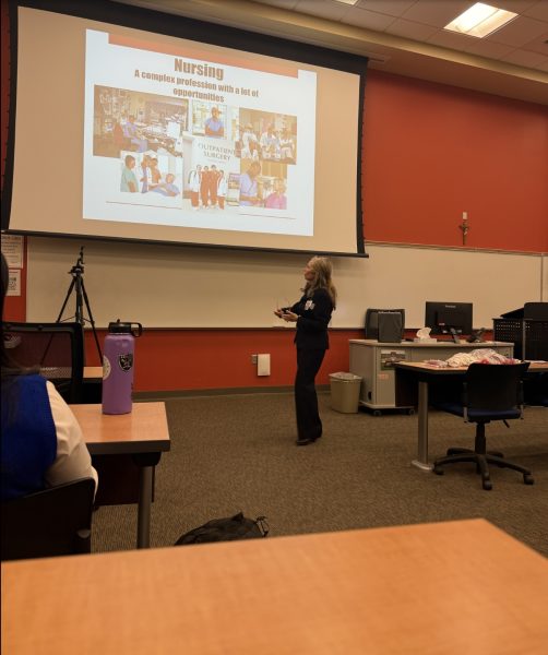 Shona Rue, the Academic Faculty and Clinical Instructor of the UNLV School of Nursing , presenting to the members of Medical Society.