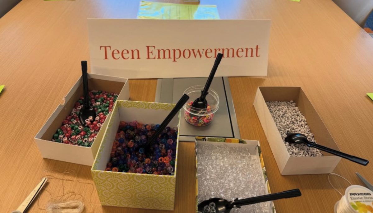 The setup Teen Empowerment made in the Student Union for their bracelets.