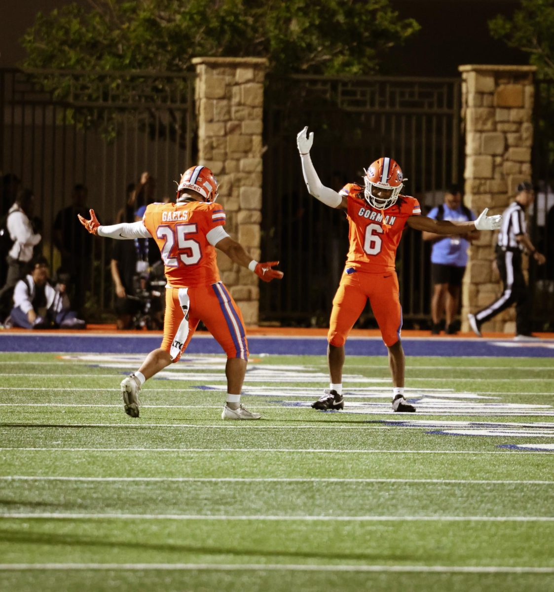 Denten Kaheaku '27 and Massiah Mingo '26 celebrating with special handshake 