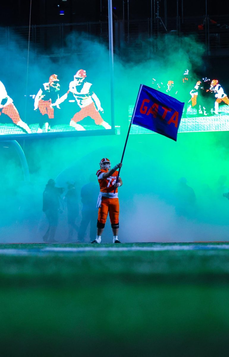 Devin Entsminger '26 waving the GATA flag before the run out 