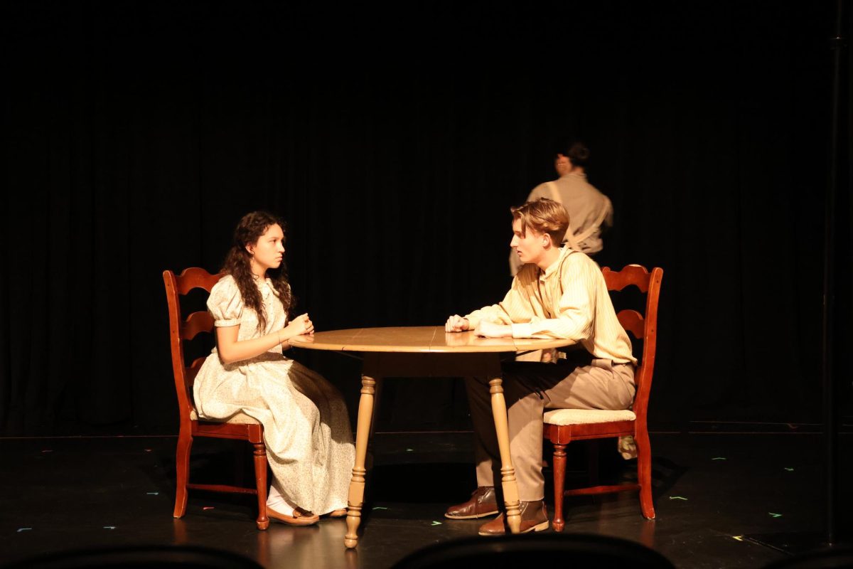 Devin Diamond '26 playing as George Webb and Olivia Mauro '28  playing Rebecca Webb in the theater production, Our town 