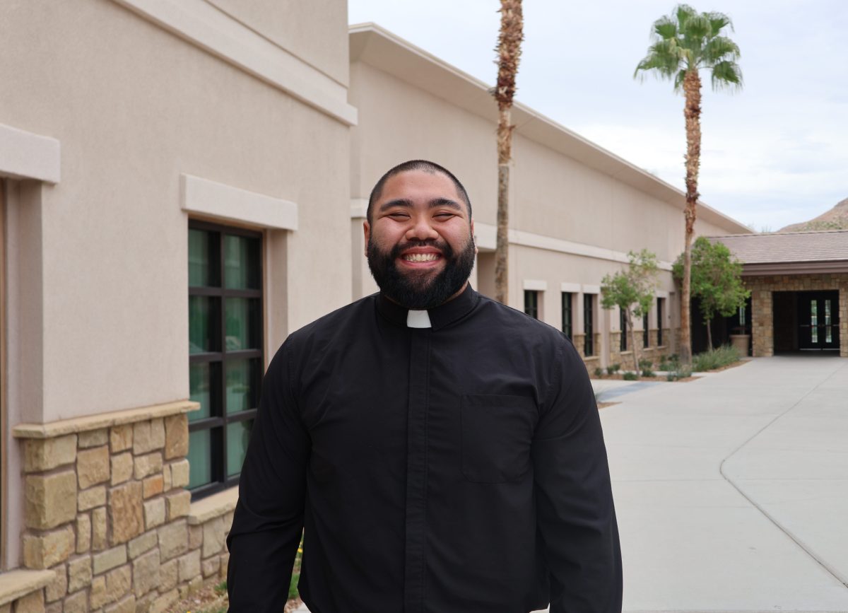 Fr. AJ outside of Campus Ministry 