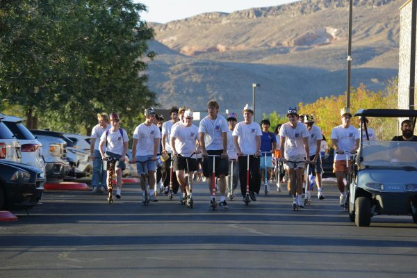 Seniors passing the football field during the senior parade. 