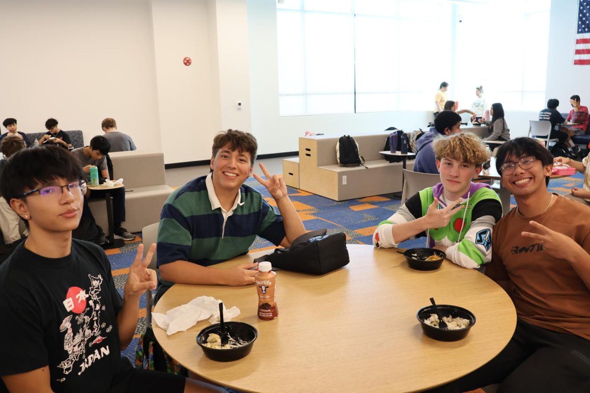 Apollo Natsis '26, Nolan Williams '26, Alexander Westphalen-Pena '26, and Breindel Yee '26 enjoying lunch in the Student Union on Toon Town Tuesday. 