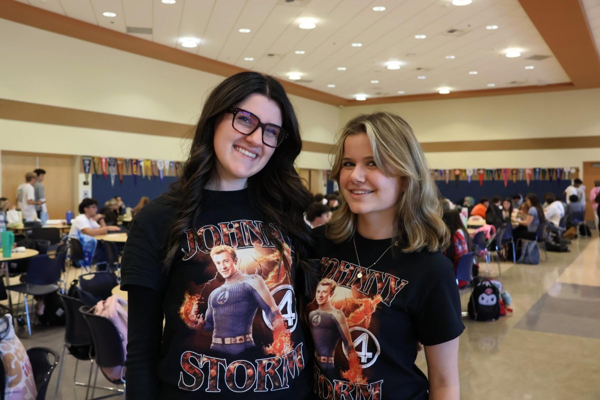 Presley Barnaby '26 and Christina Golin '26 matching Fantastic Four shirts 