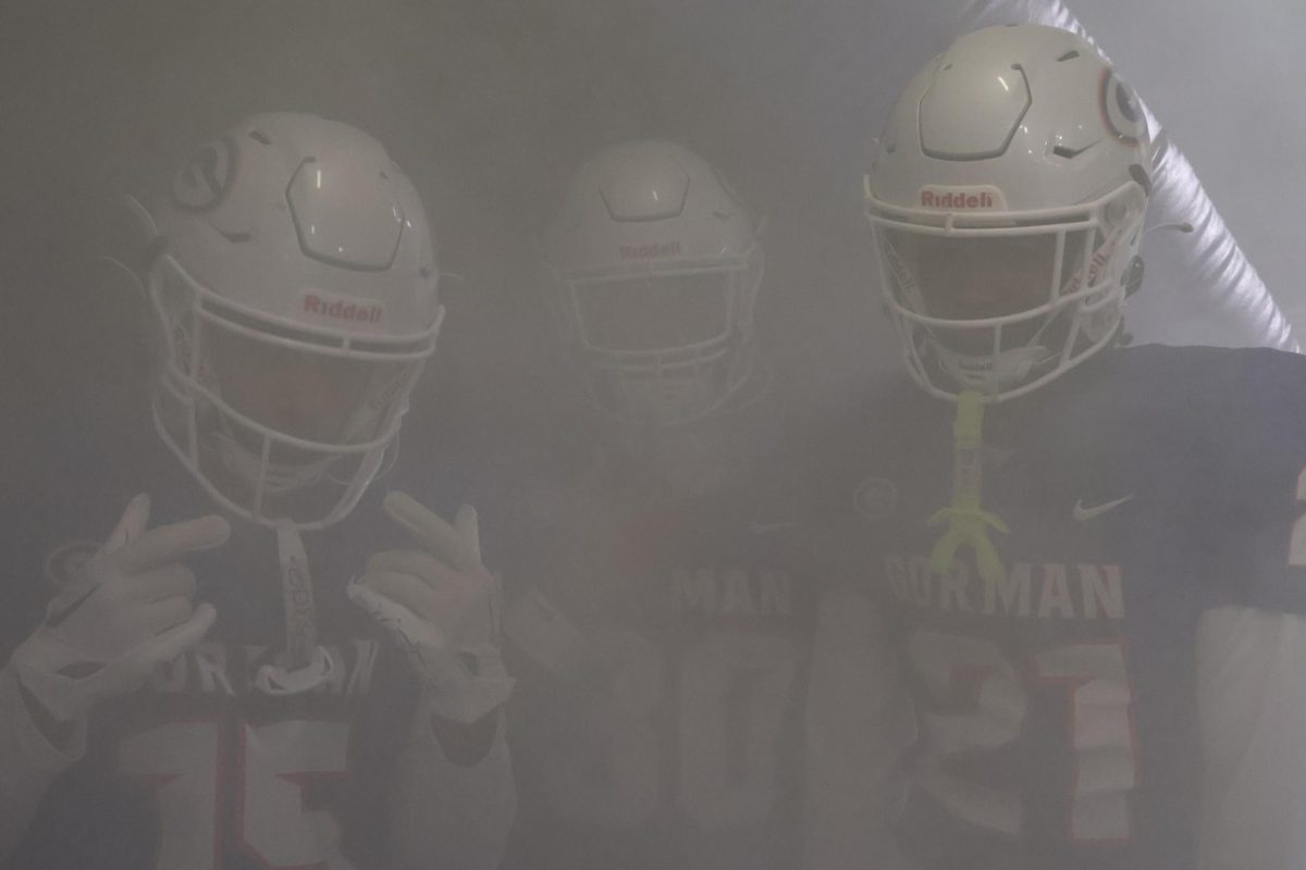 Alijah Simmons '26, Mason Senzaki '26 and Kamil Loud '27 in the tunnel before pregame runout 