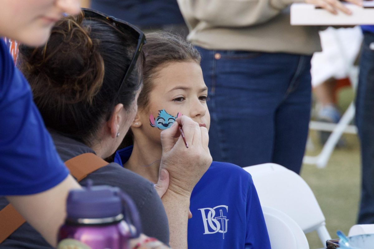 Face painting at the Homecoming tailgate
