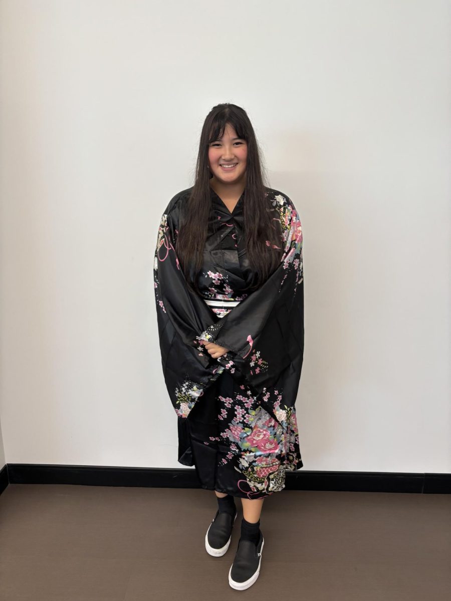 A Student showing their culture during the Its a Small World Theme day  