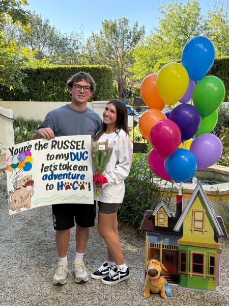 Ryan Cambeiro ‘28  asking Payton Bosari ‘28 to Homecoming with the poster he made.