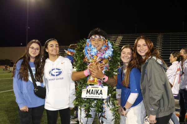 Makenzie Medford '26, Mya Munoz '26, Maika Eugenio '26, Reagan Millbern '26, and Katelyn Domina '26 taking a picture after the football game. 