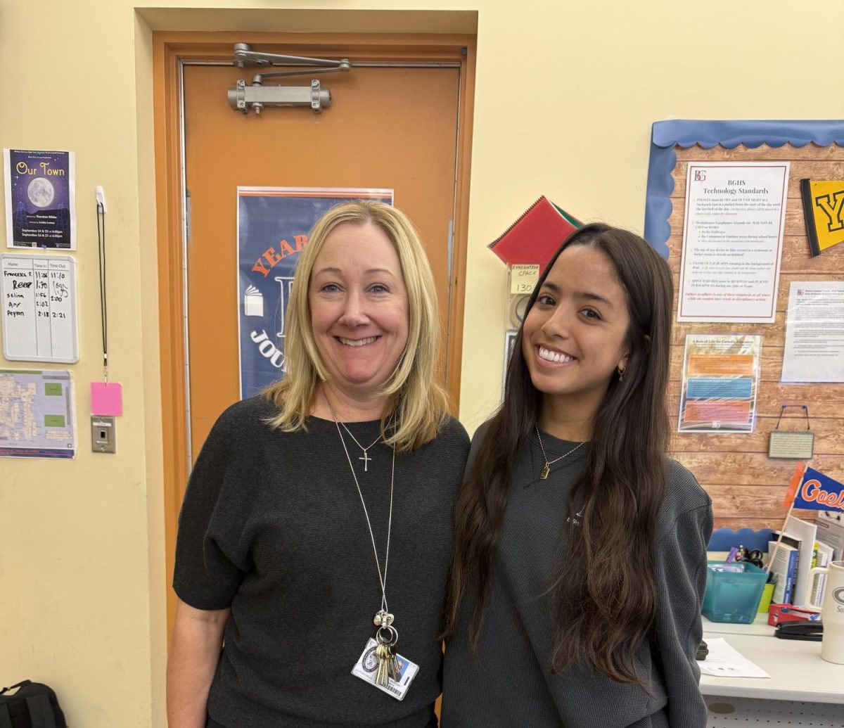 Mrs. Keating and Erica Kaffenburger '26 taking a picture in journalism. 