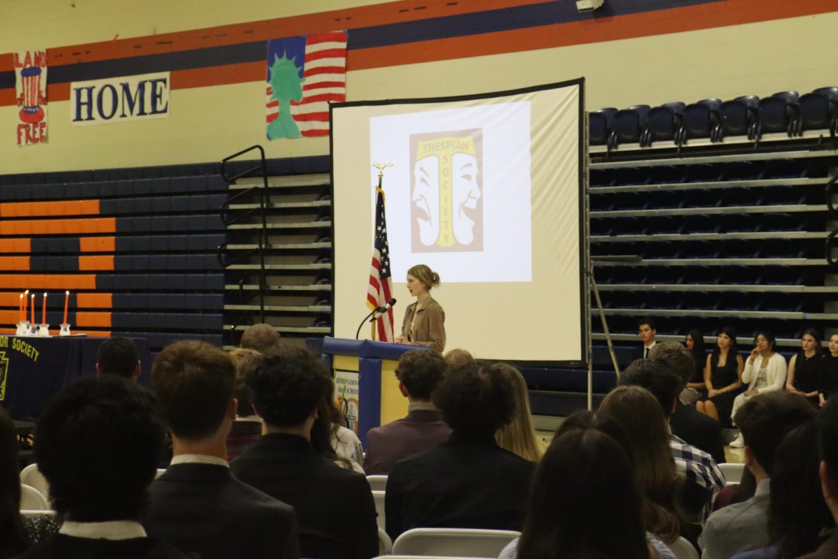 Lily Simmons '26 presenting her Honor Society 