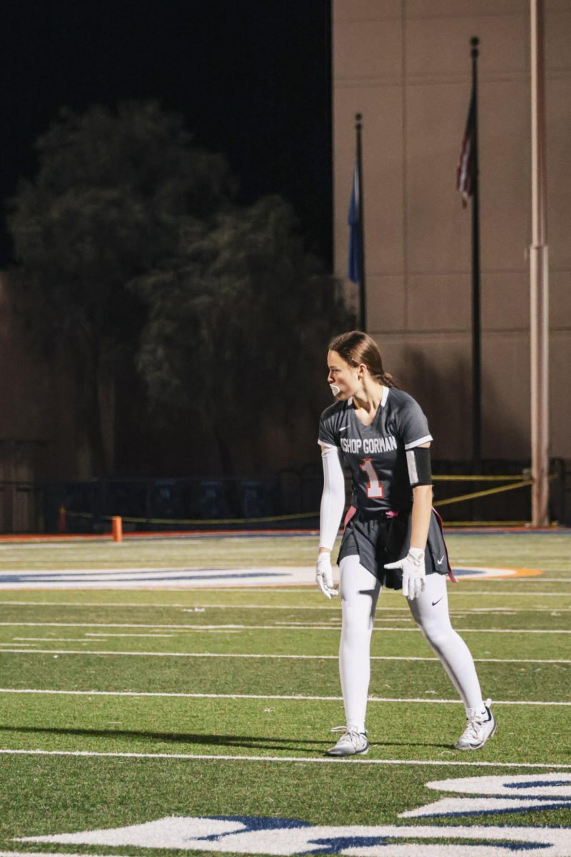 Olivia Cobell '26 Team captain and wide receiver preparing for a play 
