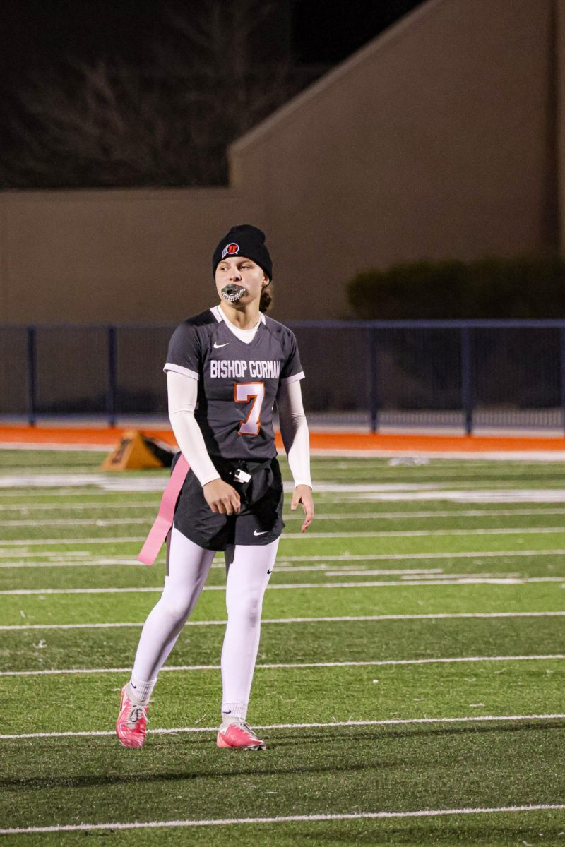 Avery Reed '26 quarter back and team captain preparing before a play 