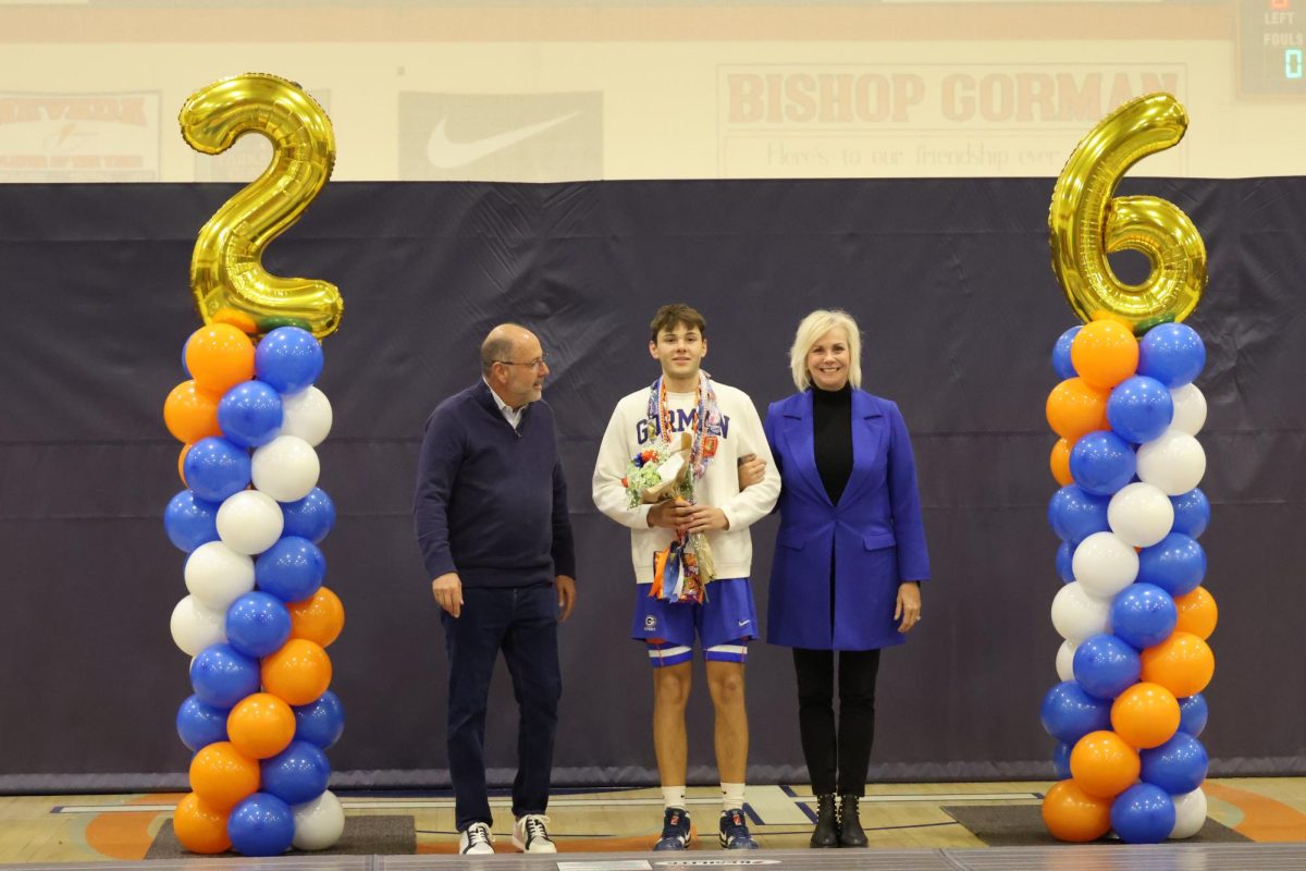 Senior Jackson Brewington with family on his senior night.