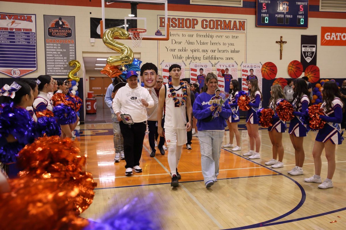 Dino Roberts Jr '26 with his family.