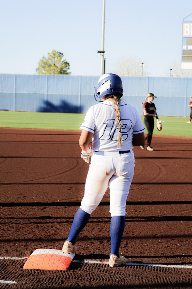 Catcher Julissa Trujillo '29 standing on first after a hit on the gap