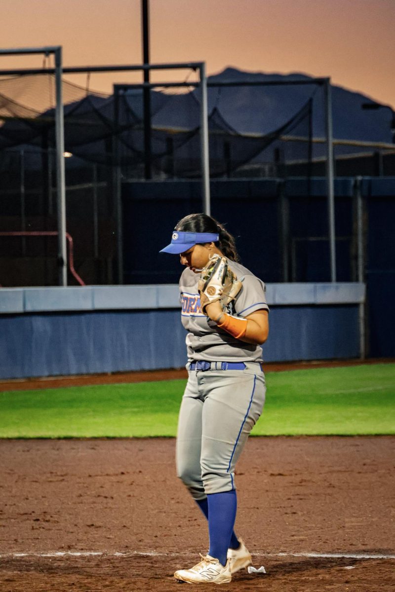 Pitcher Makamae Eugenio '27 in the Pitchers Circle Preparing to Throw a Strike