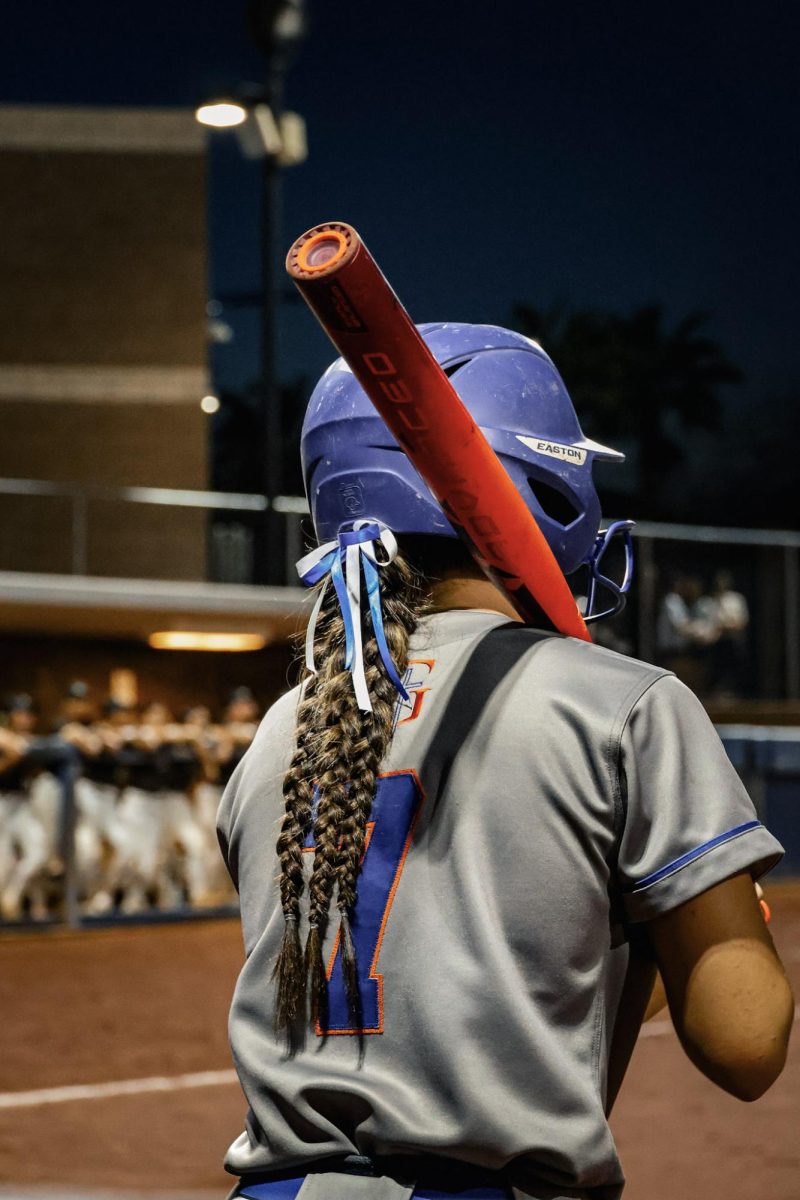 Utility player Sophia Kirkpatrick '26 on Deck Preparing to Hit 