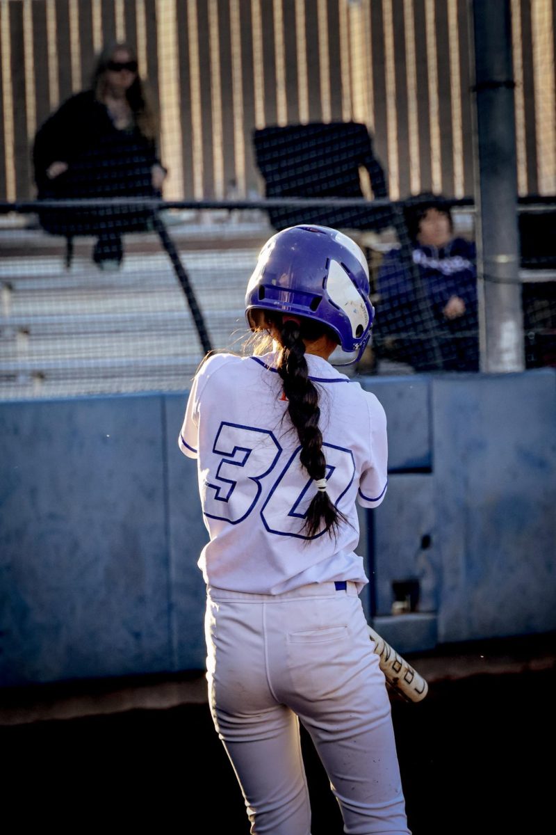 Second Baseman Leila Parangan '27 Preparing in the on deck circle to have an successful at bat 