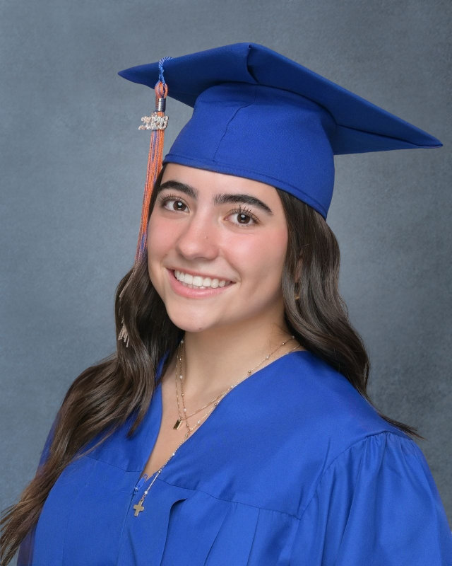 Sophia Lagomarsino ‘26 in cap and gown