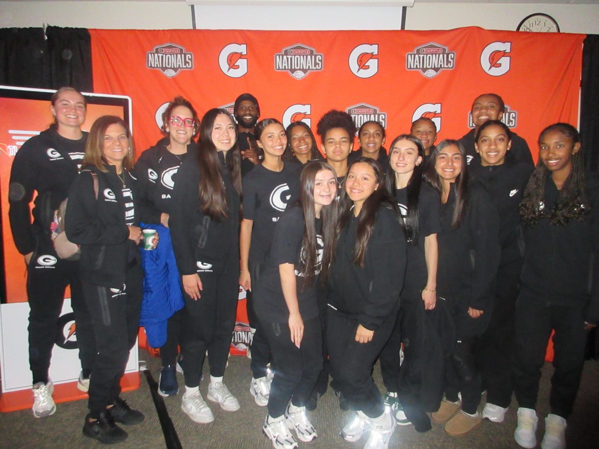 Bishop Gorman High School Women's Varsity basketball team pauses for a group photo at the Chipotle Nationals in Indianapolis, Indiana April 2, 2026.