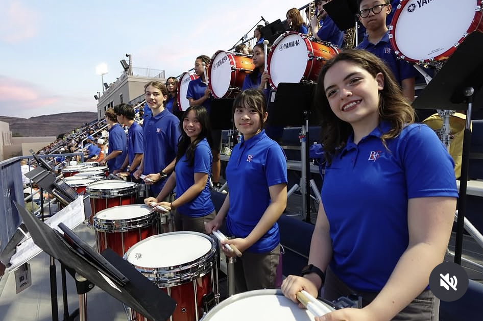 BGHS drumline preparing to perform at Fertitta Field.